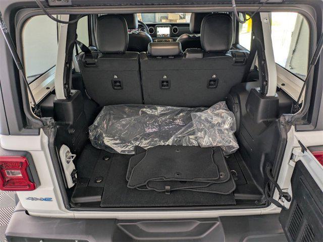used 2022 Jeep Wrangler Unlimited 4xe car, priced at $31,802