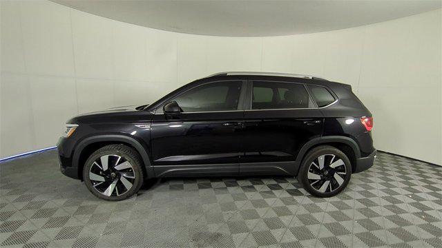 used 2024 Volkswagen Taos car, priced at $27,548