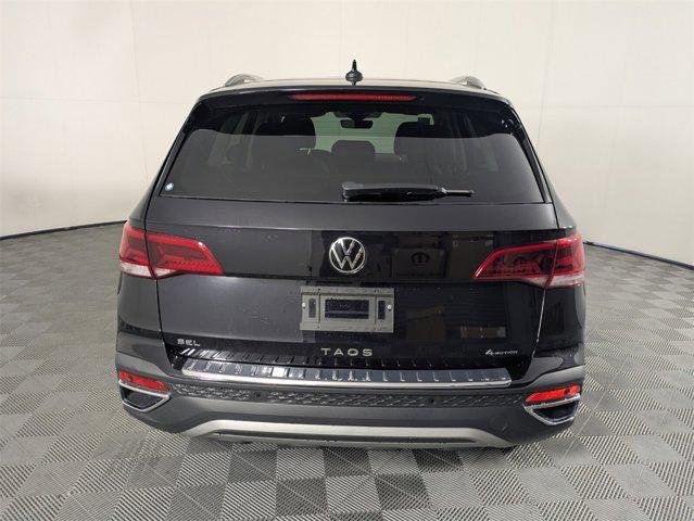 used 2024 Volkswagen Taos car, priced at $27,548