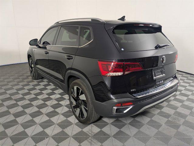 used 2024 Volkswagen Taos car, priced at $27,548