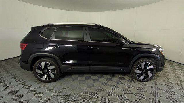 used 2024 Volkswagen Taos car, priced at $27,548