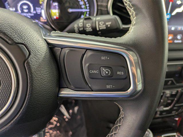 used 2023 Jeep Wrangler 4xe car, priced at $27,725