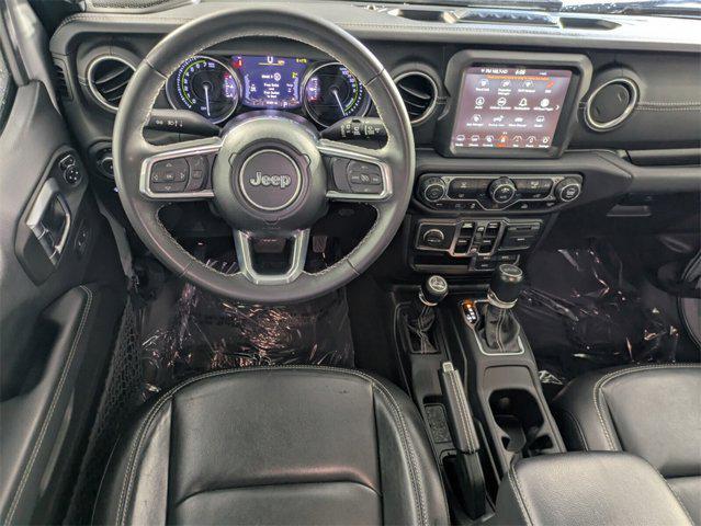 used 2023 Jeep Wrangler 4xe car, priced at $27,725