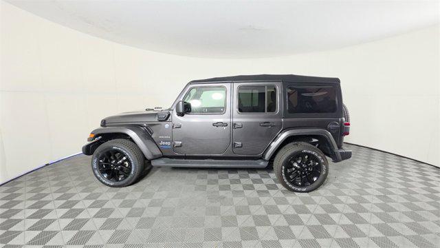 used 2022 Jeep Wrangler Unlimited 4xe car, priced at $28,588