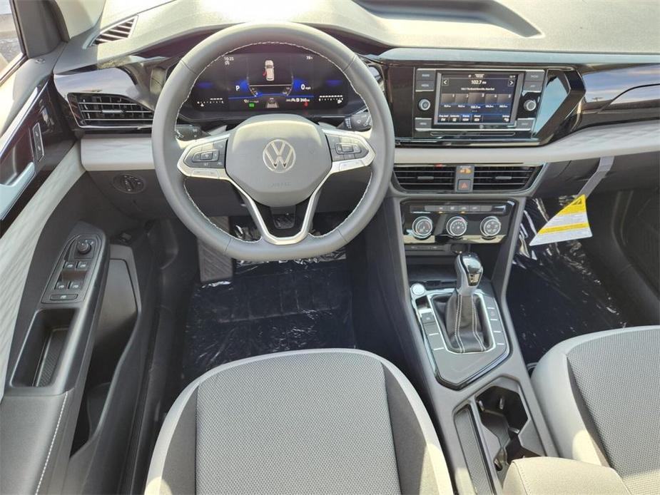 new 2024 Volkswagen Taos car, priced at $23,896