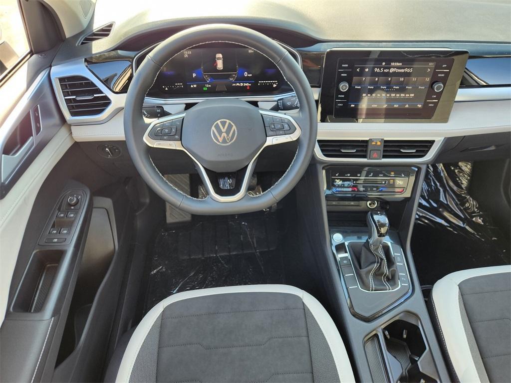 new 2025 Volkswagen Taos car, priced at $29,521