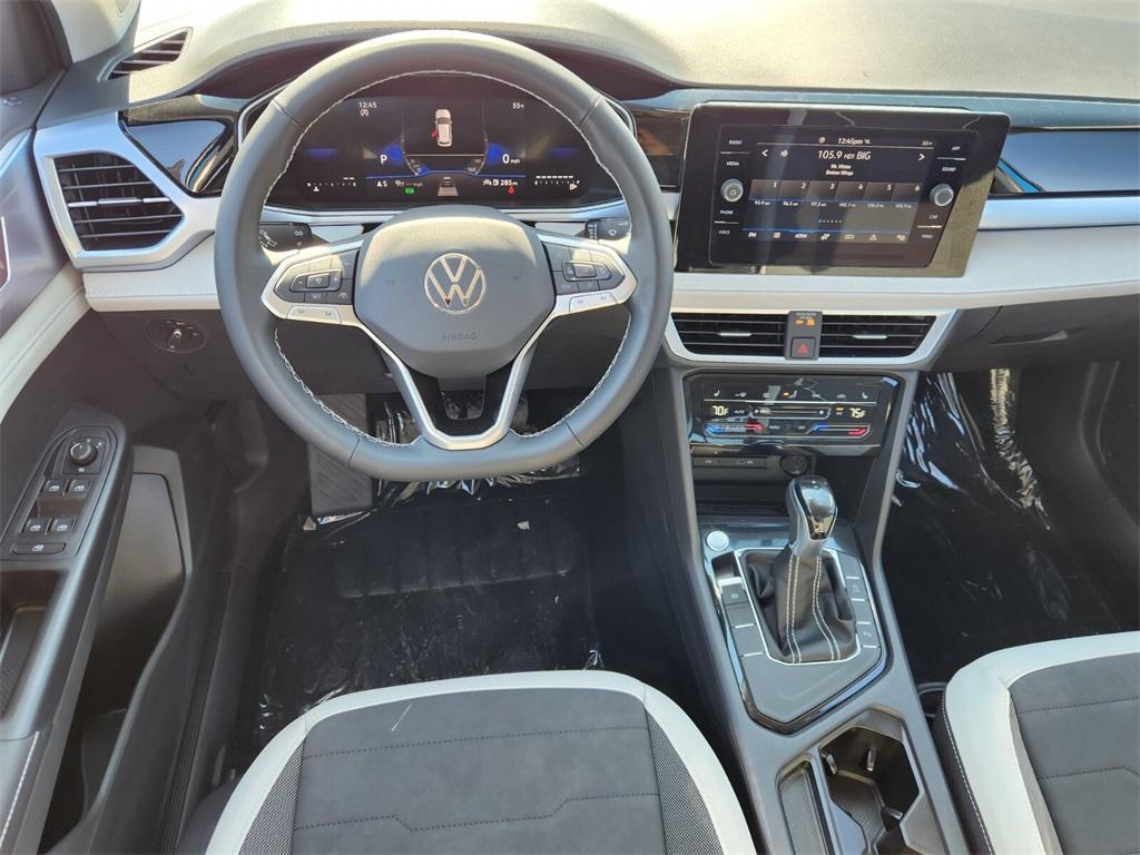 new 2025 Volkswagen Taos car, priced at $31,176