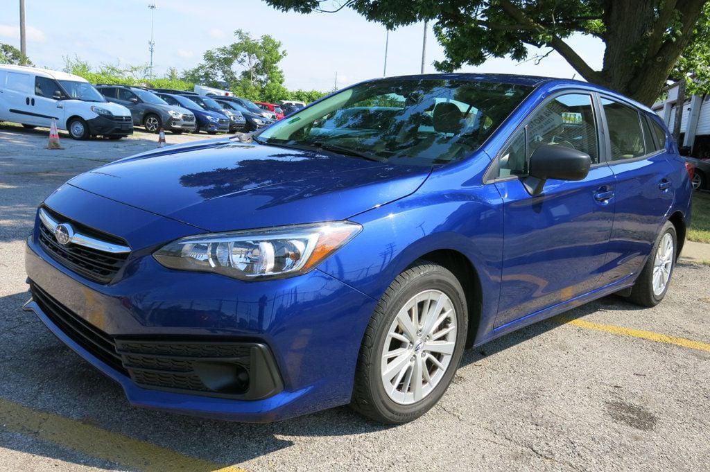 used 2023 Subaru Impreza car, priced at $12,995