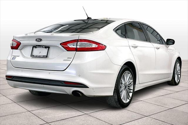 used 2016 Ford Fusion car, priced at $7,677