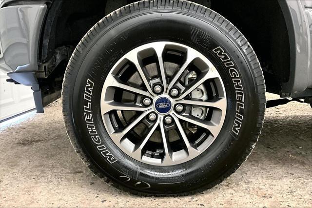 used 2018 Ford F-150 car, priced at $25,977