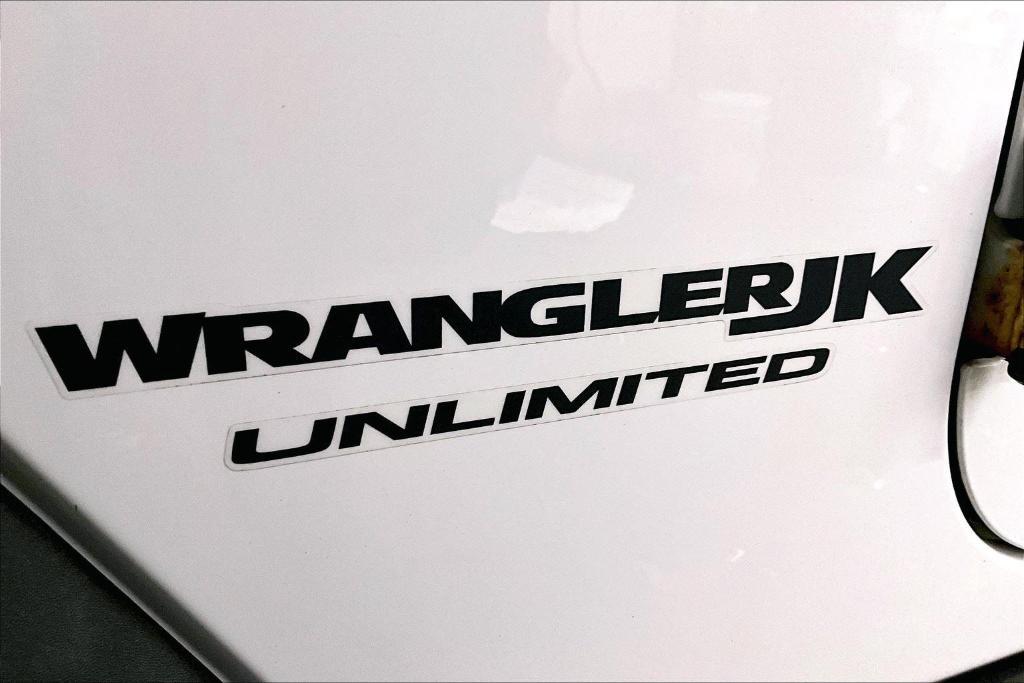 used 2018 Jeep Wrangler JK Unlimited car, priced at $19,577