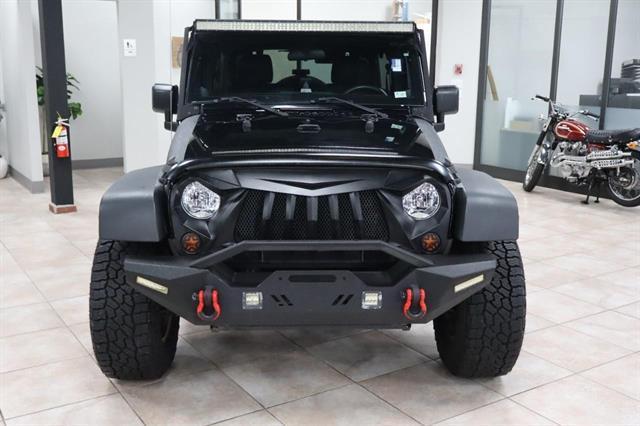 used 2012 Jeep Wrangler Unlimited car, priced at $16,447