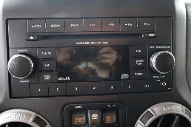 used 2012 Jeep Wrangler Unlimited car, priced at $16,447