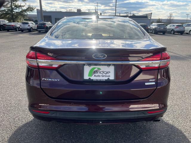 used 2018 Ford Fusion car, priced at $9,675