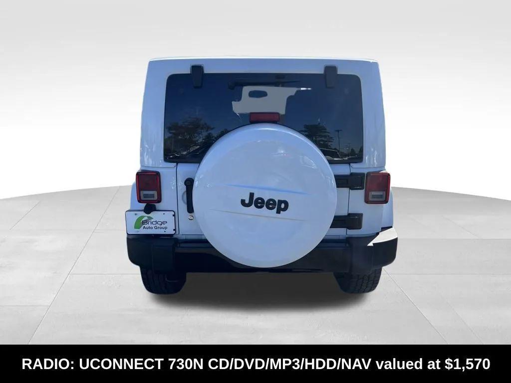 used 2014 Jeep Wrangler Unlimited car, priced at $16,981