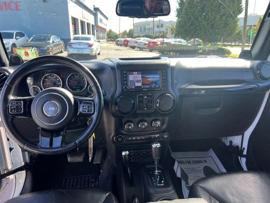used 2014 Jeep Wrangler Unlimited car, priced at $16,981