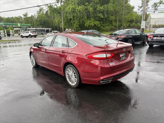 used 2016 Ford Fusion car, priced at $12,700
