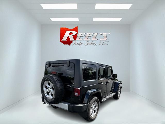 used 2015 Jeep Wrangler Unlimited car, priced at $21,764