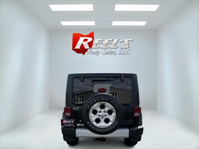 used 2015 Jeep Wrangler Unlimited car, priced at $21,764