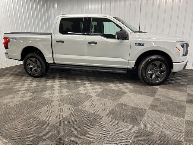 used 2024 Ford F-150 Lightning car, priced at $49,699