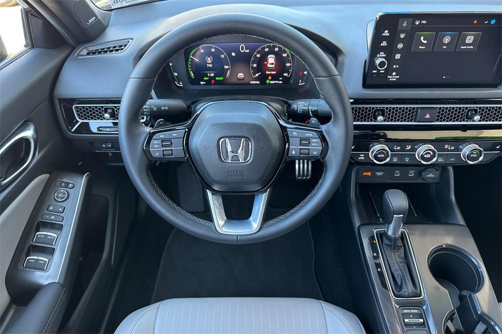used 2025 Honda Civic Hybrid car, priced at $31,485
