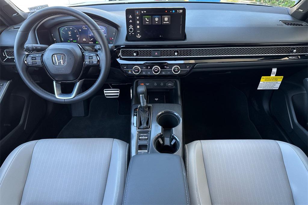 used 2025 Honda Civic Hybrid car, priced at $31,485