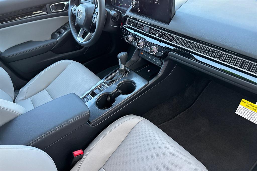 used 2025 Honda Civic Hybrid car, priced at $31,485
