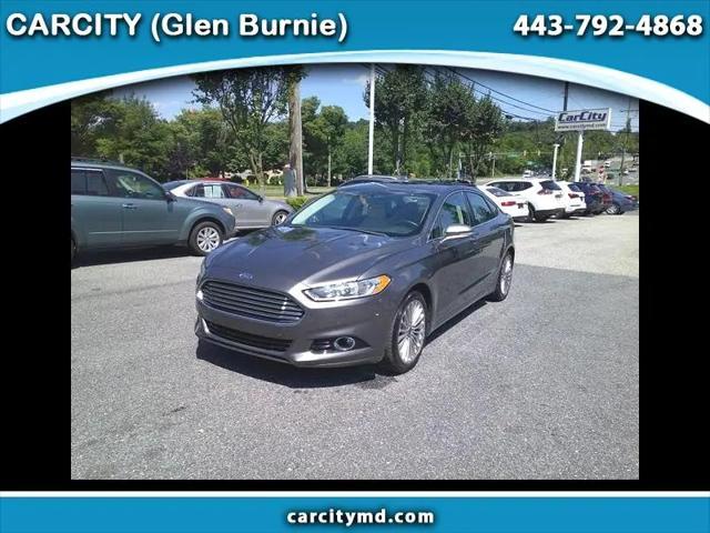 used 2014 Ford Fusion car, priced at $11,895