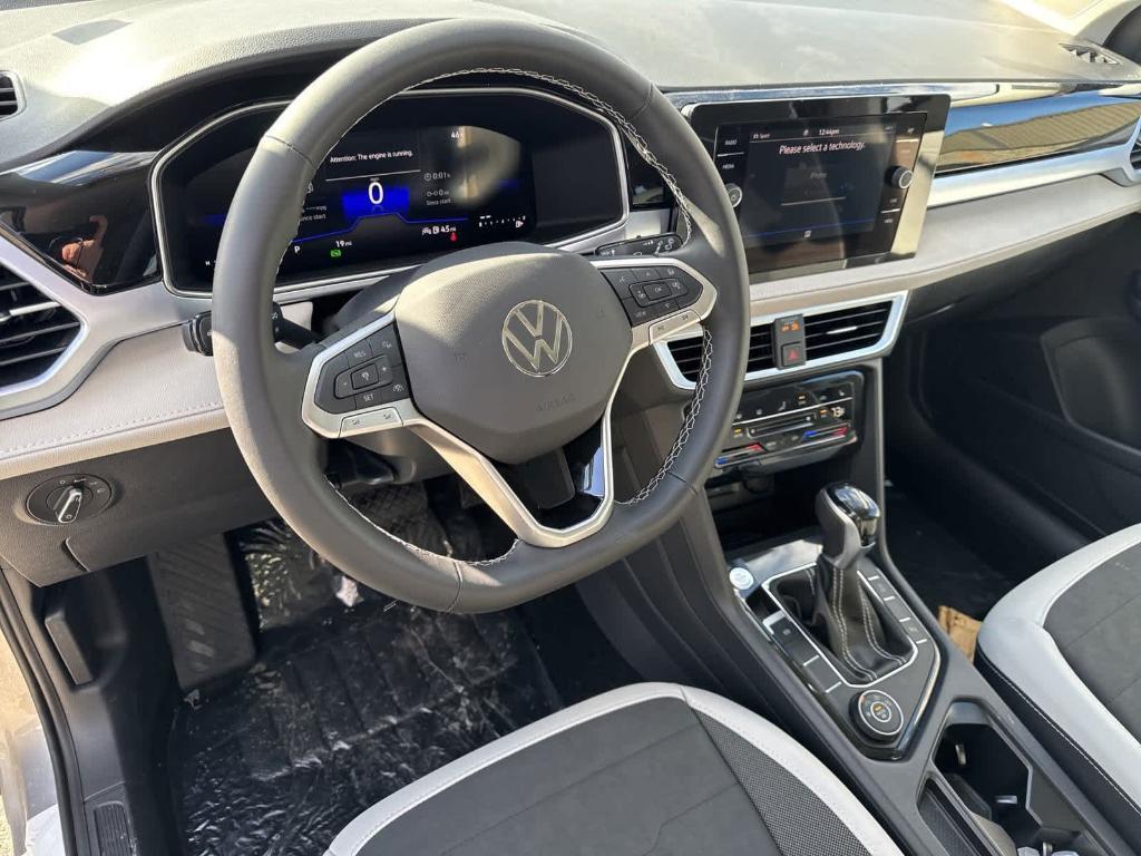 new 2025 Volkswagen Taos car, priced at $31,176