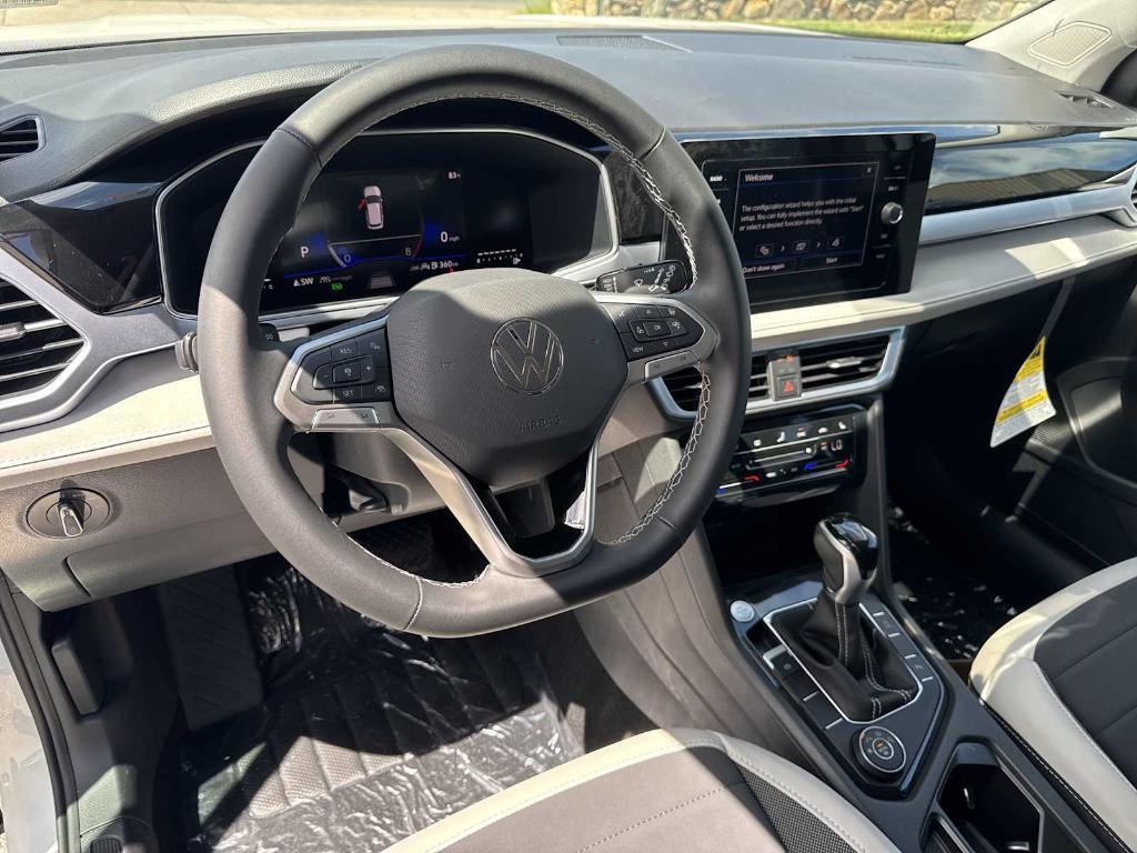 new 2025 Volkswagen Taos car, priced at $30,697