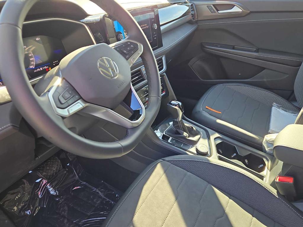 new 2025 Volkswagen Taos car, priced at $33,008