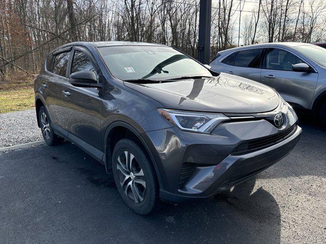 used 2018 Toyota RAV4 car, priced at $15,000