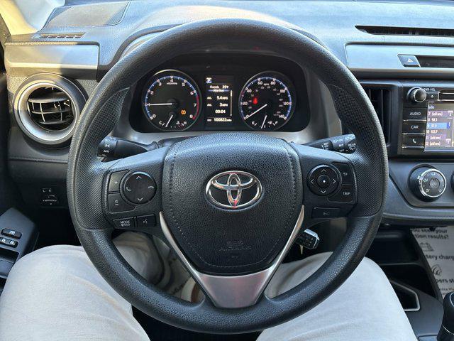 used 2018 Toyota RAV4 car, priced at $15,000