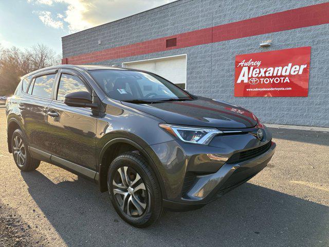 used 2018 Toyota RAV4 car, priced at $15,000