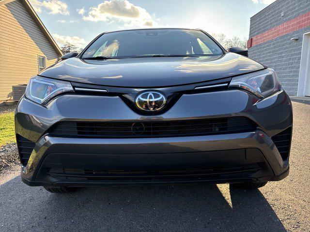 used 2018 Toyota RAV4 car, priced at $15,000