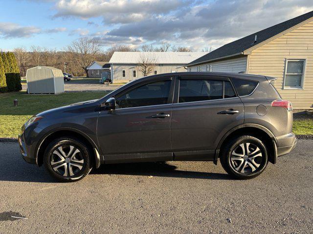 used 2018 Toyota RAV4 car, priced at $15,000