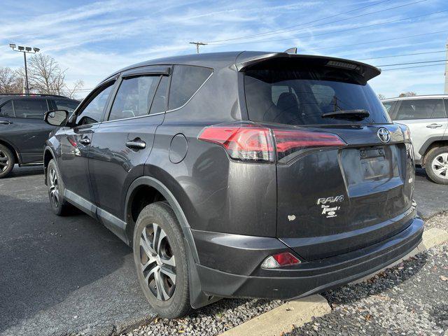 used 2018 Toyota RAV4 car, priced at $15,000