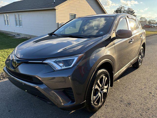 used 2018 Toyota RAV4 car, priced at $15,000