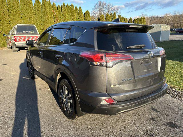 used 2018 Toyota RAV4 car, priced at $15,000