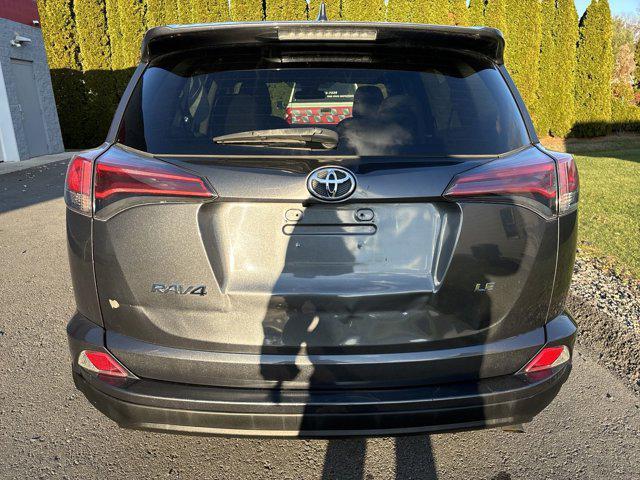 used 2018 Toyota RAV4 car, priced at $15,000