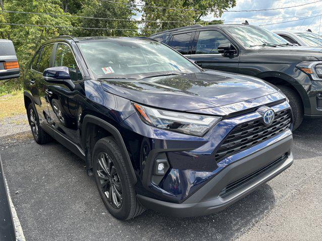 used 2023 Toyota RAV4 Hybrid car, priced at $34,000