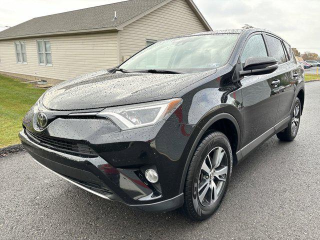 used 2018 Toyota RAV4 car, priced at $20,000