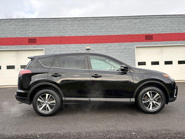 used 2018 Toyota RAV4 car, priced at $20,000