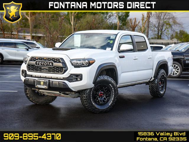 used 2018 Toyota Tacoma car, priced at $36,299