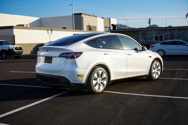 used 2022 Tesla Model Y car, priced at $28,199