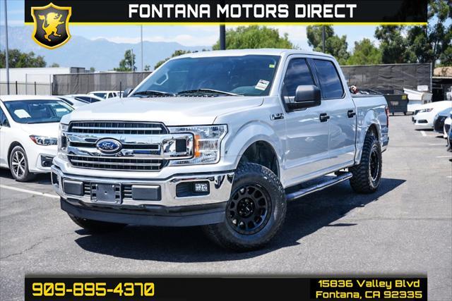 used 2018 Ford F-150 car, priced at $24,418