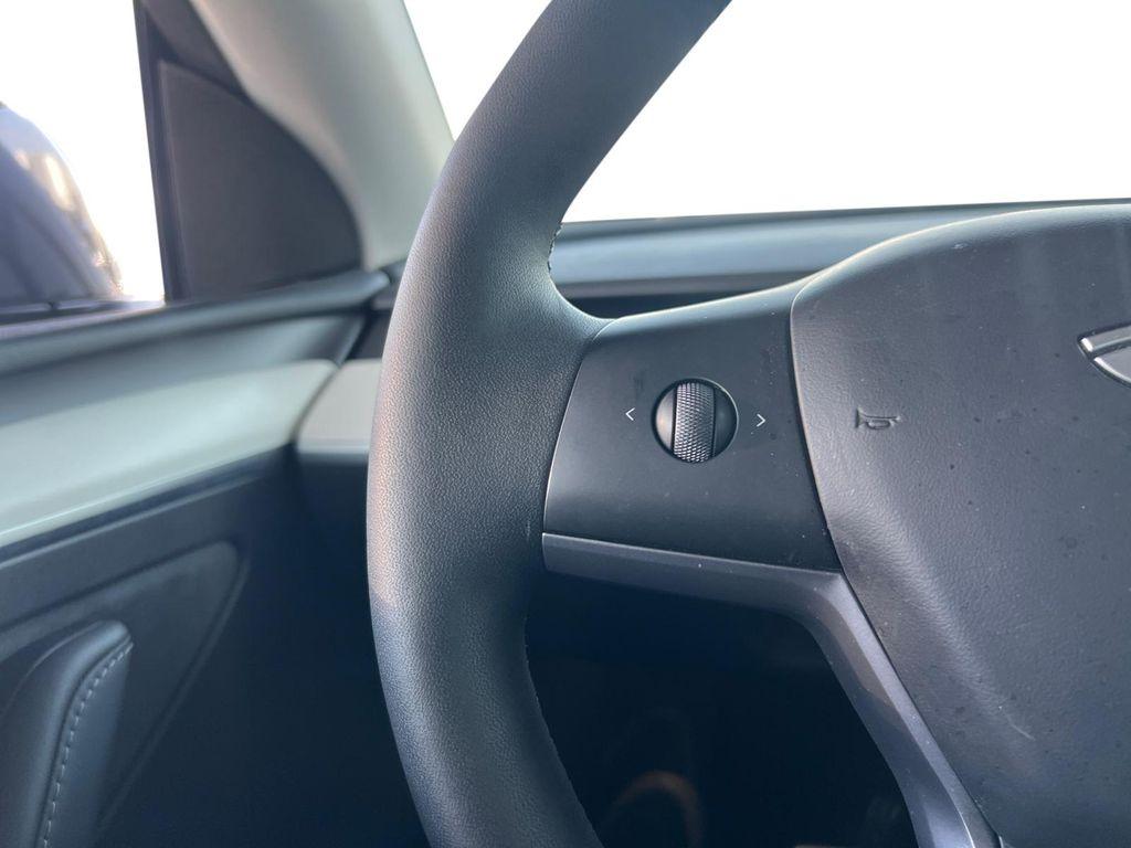 used 2024 Tesla Model Y car, priced at $36,995