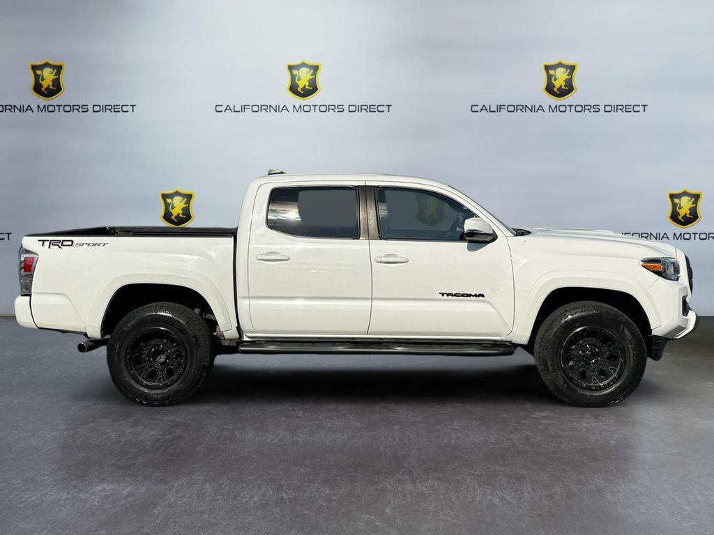 used 2021 Toyota Tacoma car, priced at $28,599