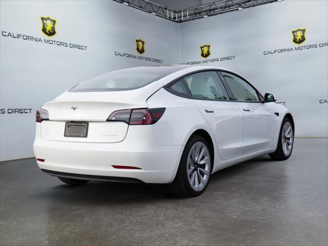 used 2022 Tesla Model 3 car, priced at $27,699