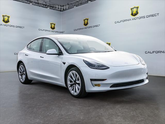 used 2022 Tesla Model 3 car, priced at $27,699